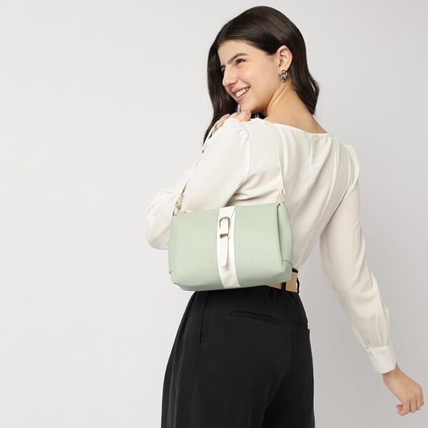 soft serve shoulder bag for women, medium size with top zip closure, buckle detailing and inner organiser pockets, everyday casual shoulder bag